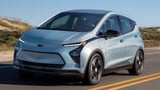 2023 Chevy Bolt EV hatchback on freeway front view