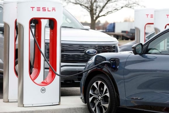 Cars Charging at Tesla Charging Station