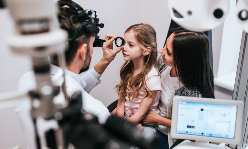 Young girl at the eye doctors