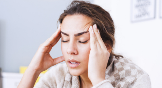 Woman with tension headache