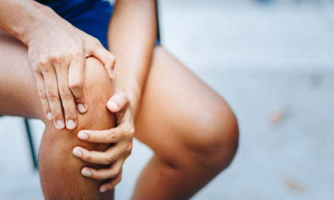 Woman with joint pain in knee