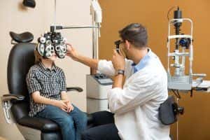 Image of a child getting an eye exam.
