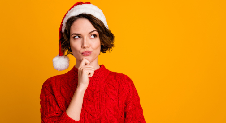 Woman contemplates healthy eating decisions for the holidays