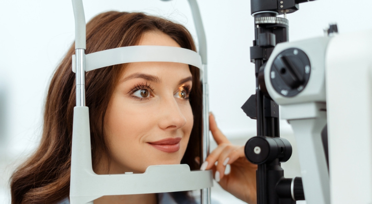 Woman is happy to be examined by her optometrist.