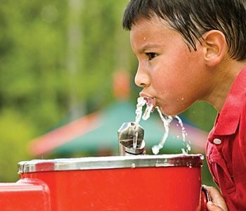 Child drinking water.