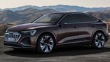 2024 Audi Q8 e-tron electric crossover front view on road