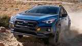 2024 subaru crosstrek wilderness blue off-road climbing front view