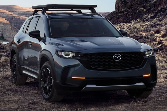 2022 Mazda CX-50 crossover in gray with roof rack off-road
