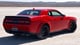 Dodge Challenger coupe red color rear view