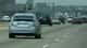 Hybrid Car On Freeway