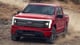 Ford F-150 Lightning off-road red color
