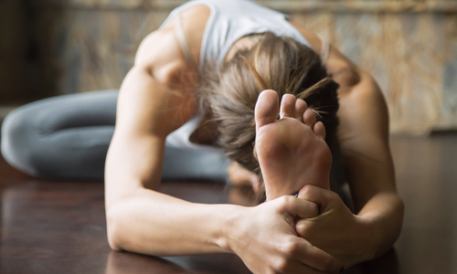 Woman practicing yoga pose