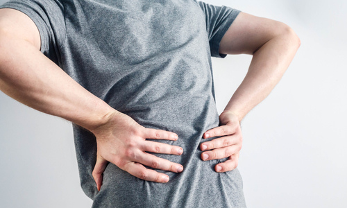Man suffering from pain in lower back