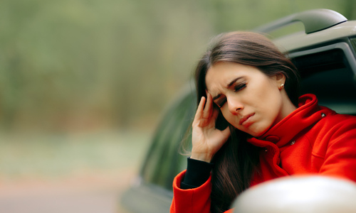 Woman experiencing motion sickness