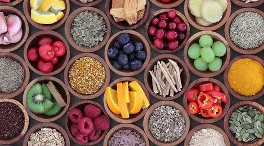 Image of different fruits and vegetables in baskets.