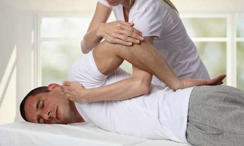 Man receiving chiropractic treatment