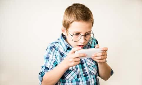 Little boy using a smartphone