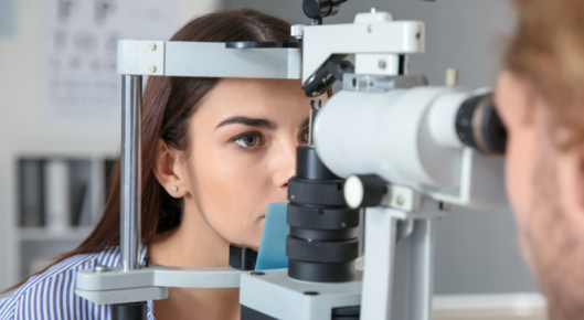 Determined woman receives eye exam
