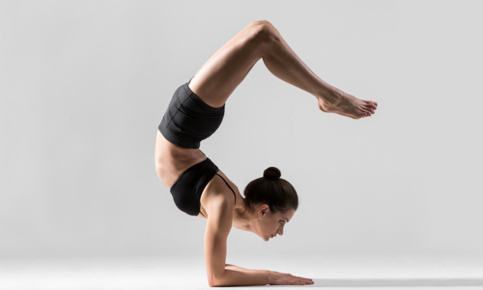 Beautiful young woman practicing yoga, preparation for handstand exercise  Stock Photo - Alamy