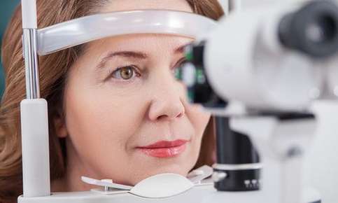 Woman receiving an eye exam