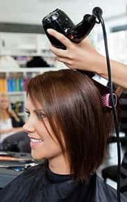 Image of a woman at a hair salon.