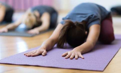 Woman practicing child's pose