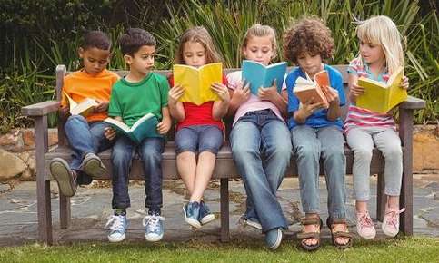 Children reading in a row