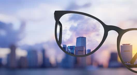 Glasses focusing on city