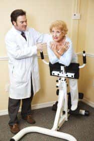 image of a chiropractor working with an elderly woman