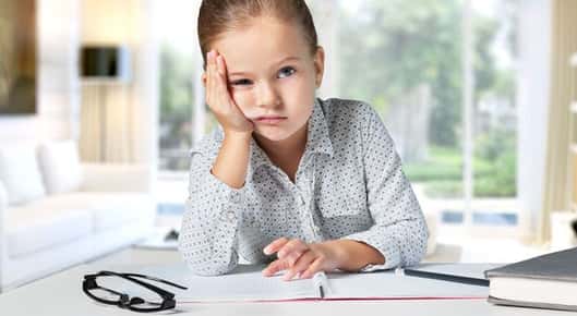 Young girl having trouble with homework