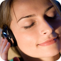 image of woman listening to headphones. 