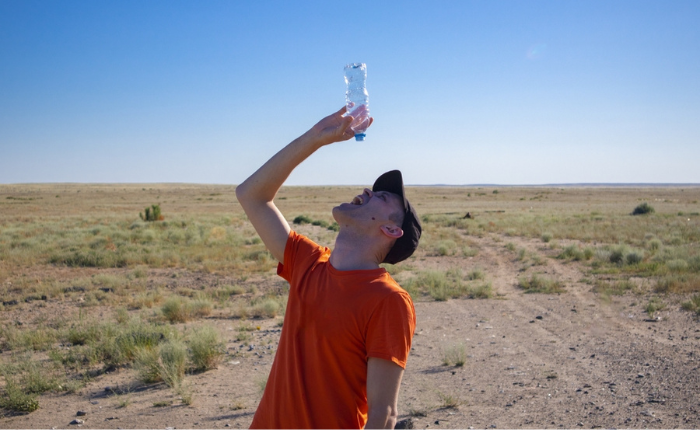 Man seeking more water in the desert.