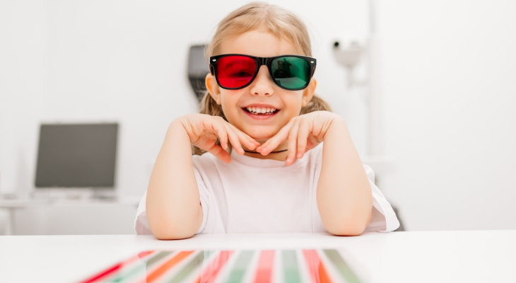Little girl participates in vision therapy.