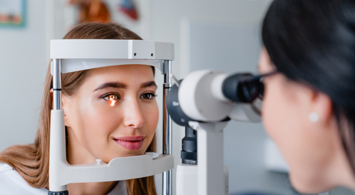 Woman receives eye exam