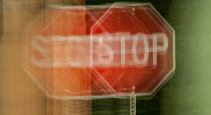 Blurry double vision stop sign.