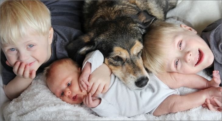 young boys with older dog