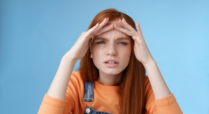 Woman struggles to see.