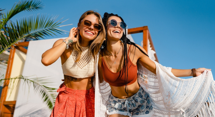 Two women wearing sunglasses.