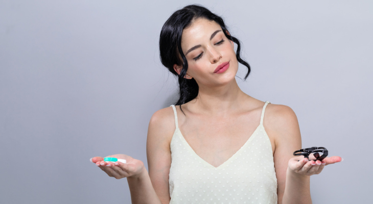 Woman weighs her vision correction options.