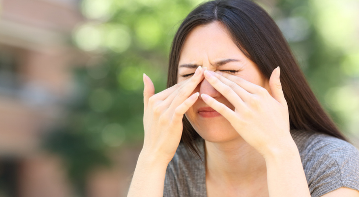 Woman with irritated eyes