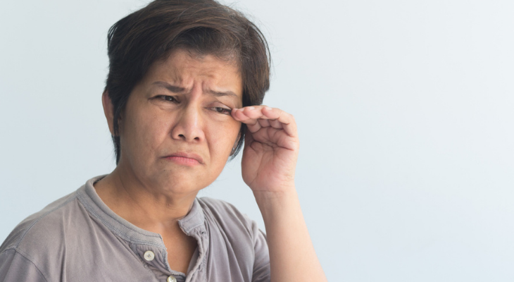 Woman suffering from dry eyes