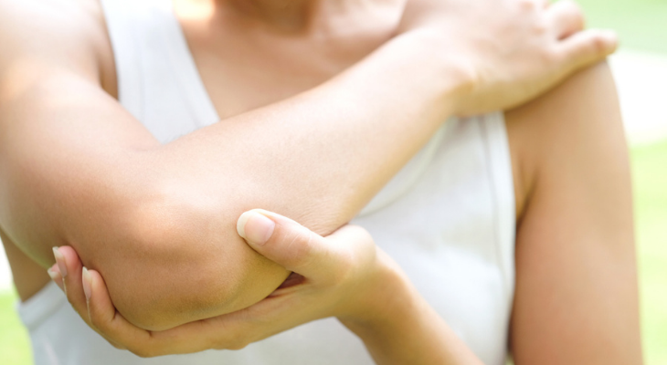 Woman with elbow pain