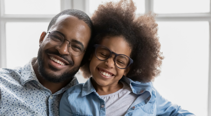 Dad and daughter wearing glasses