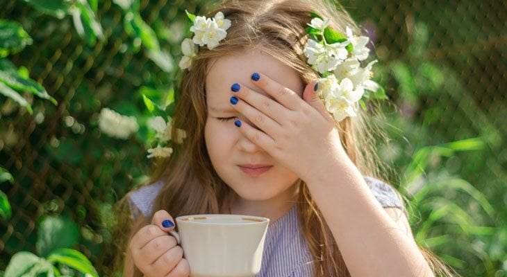 Young girl having trouble with eyes