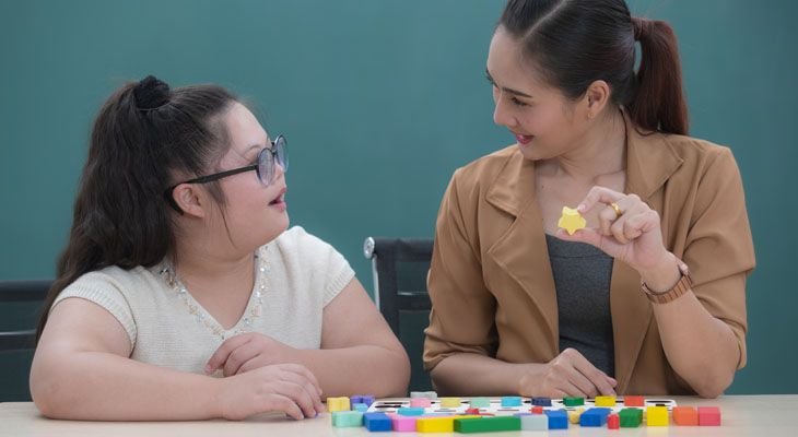 Girl with autism learning