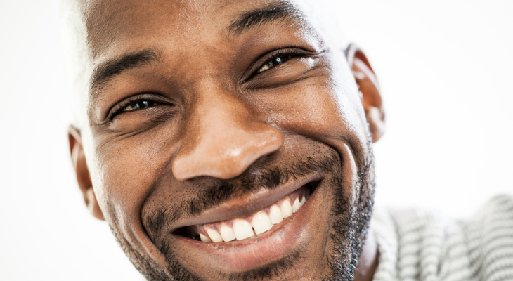 Extreme close up of smiling man.