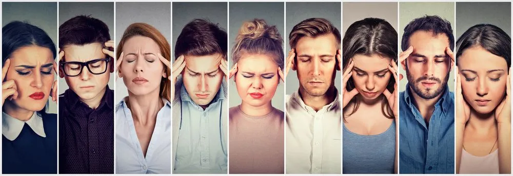 Group of individuals all having headaches and holding their head