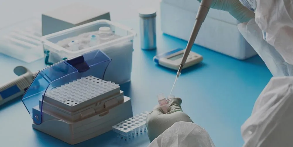 Lab drawing samples into vials