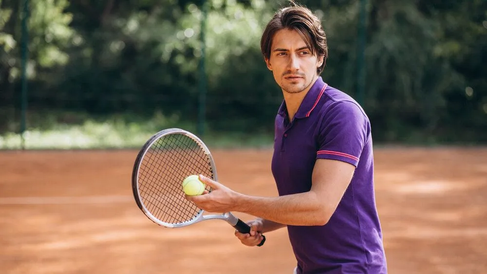 man playing tennis