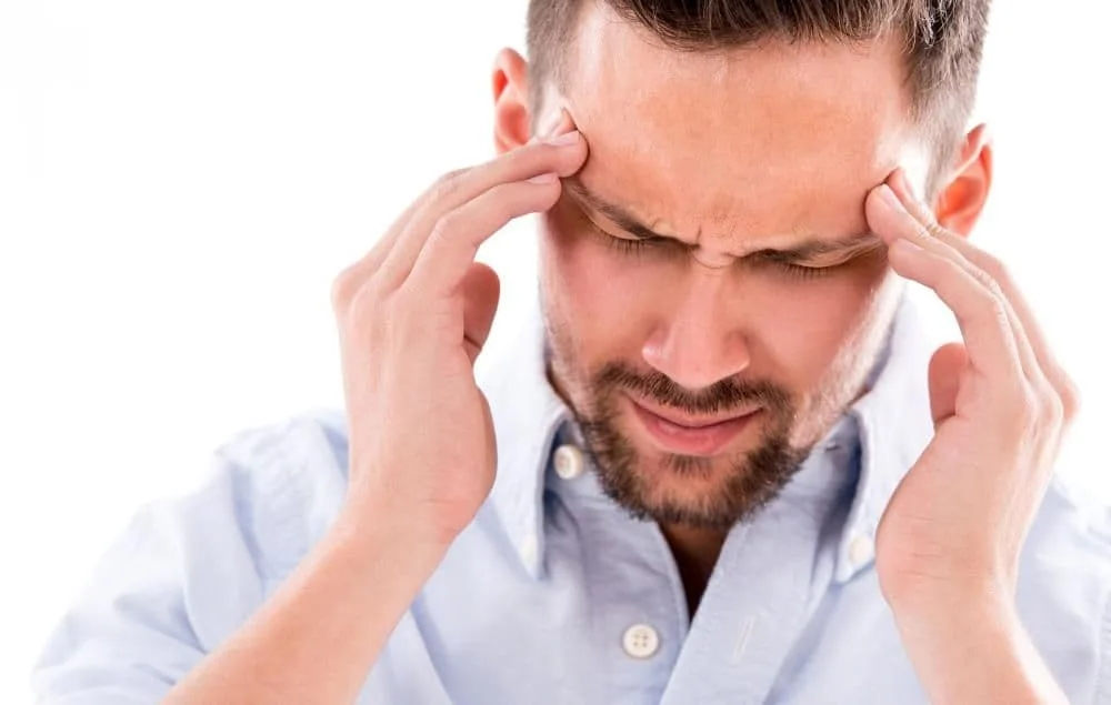 Man experiencing a headache